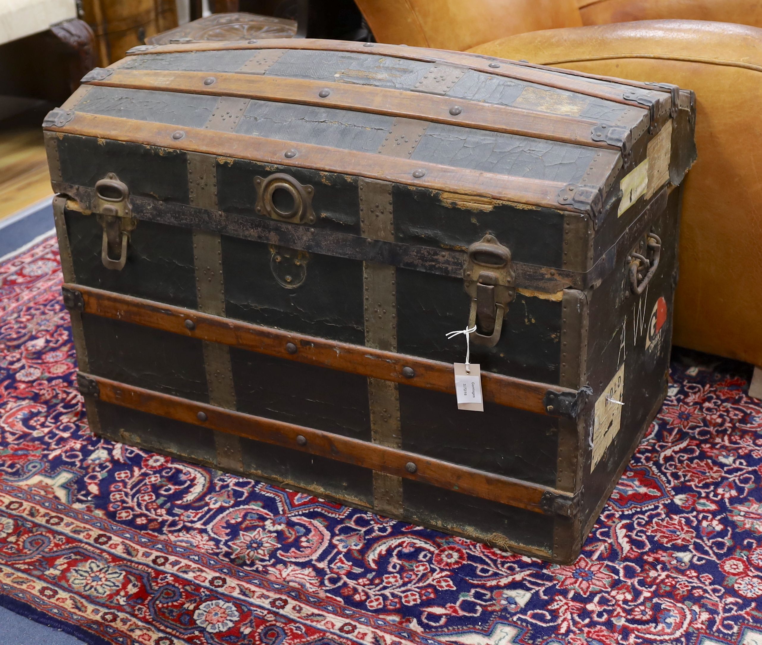 A late Victorian wood bound domed camphorwood and canvas covered trunk, length 85cm, depth 50cm, height 59cm